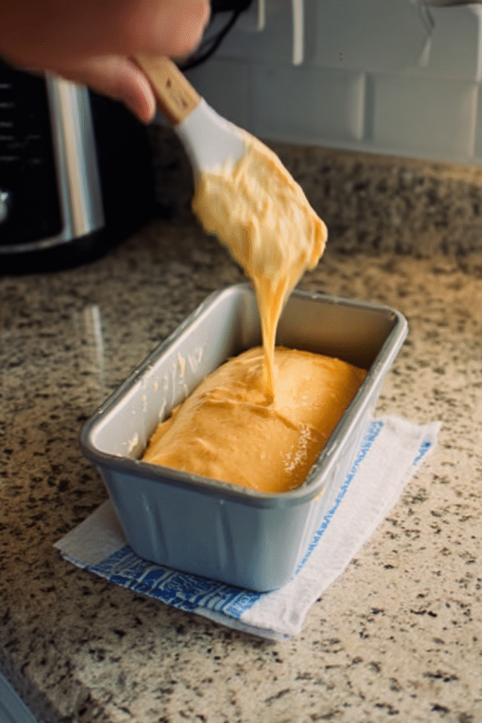 Peach cake batter in loaf pan