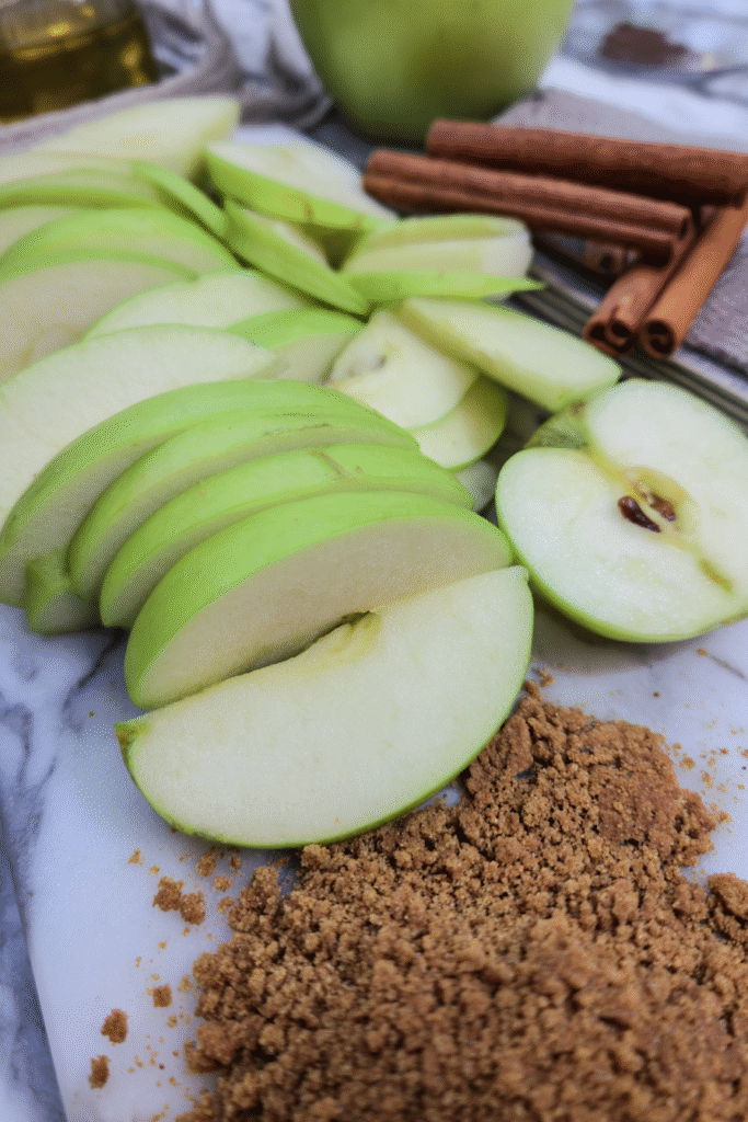 Ingredients for caramel apple cheesecake bars on counter