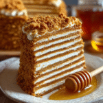Authentic Russian Honey Cake Medovik with golden layers and cream filling