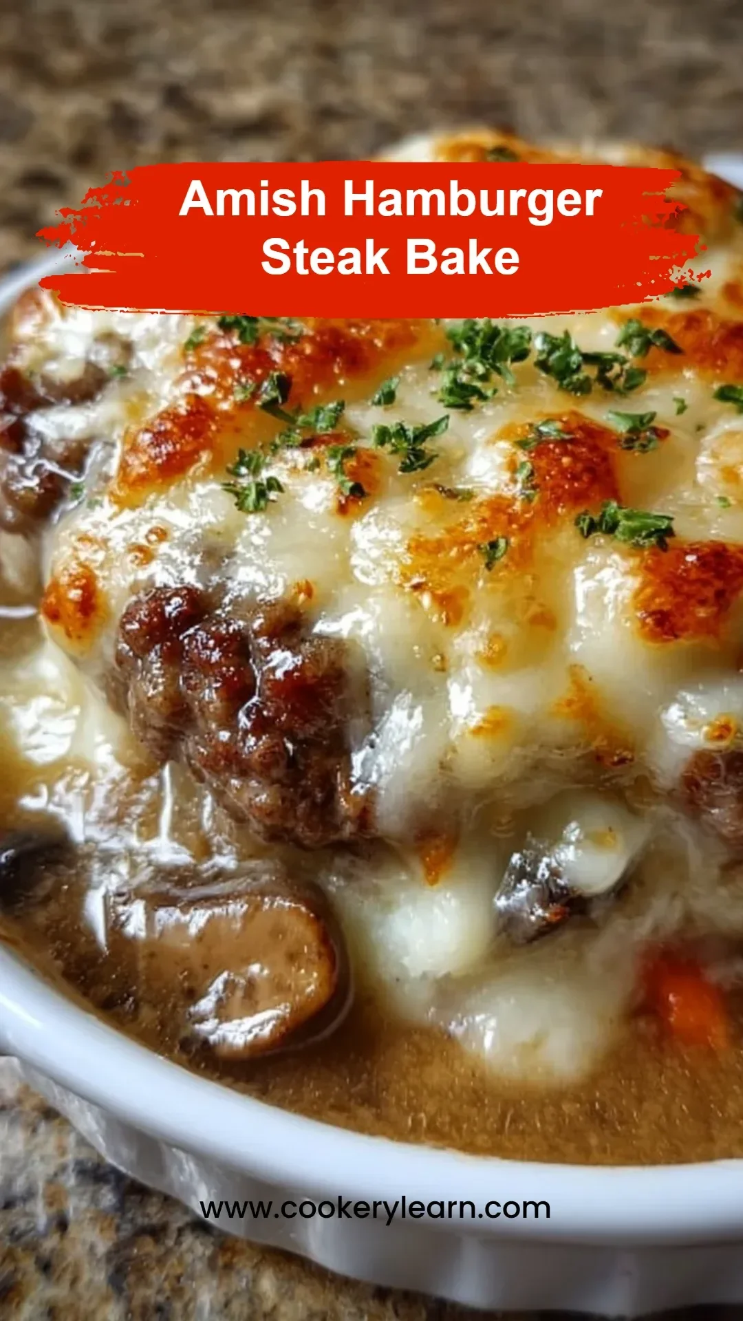 Amish hamburger steak bake served on a plate with vegetables