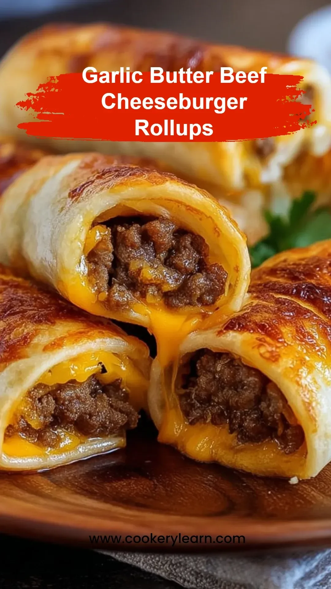 Garlic butter beef cheeseburger rollups served on a plate with fresh garnishes