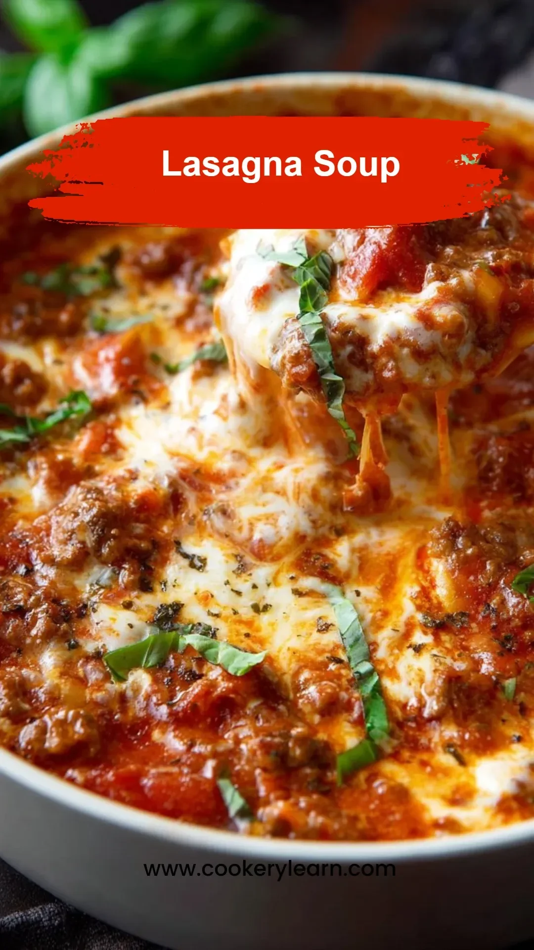 A bowl of hearty Lasagna Soup garnished with fresh herbs and cheese