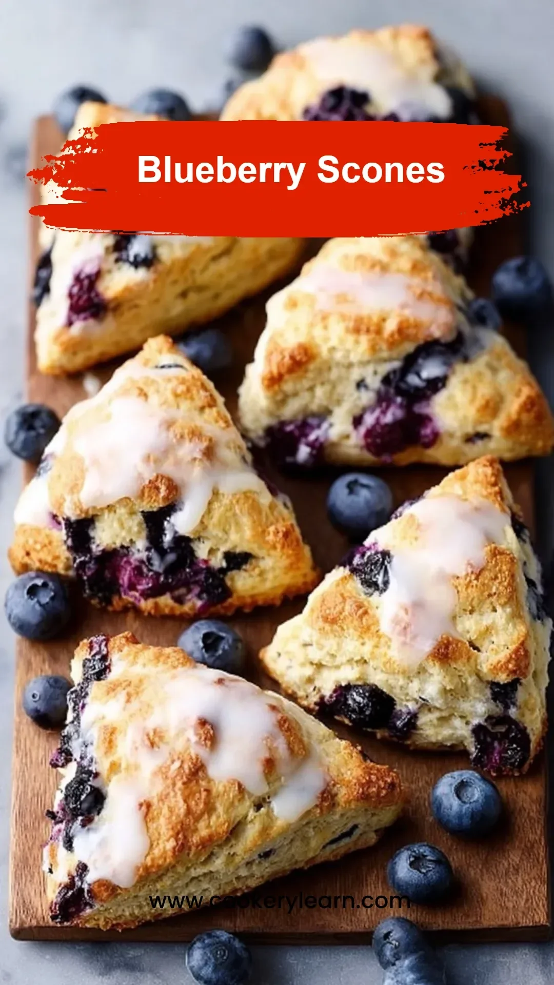 Freshly baked blueberry scones on a cooling rack