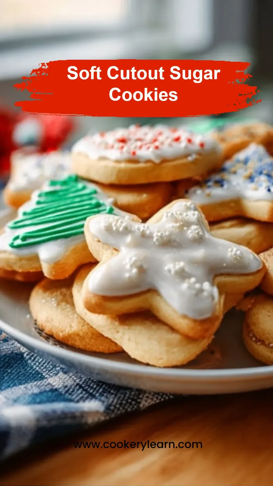 Plate of soft cutout sugar cookies decorated with icing.