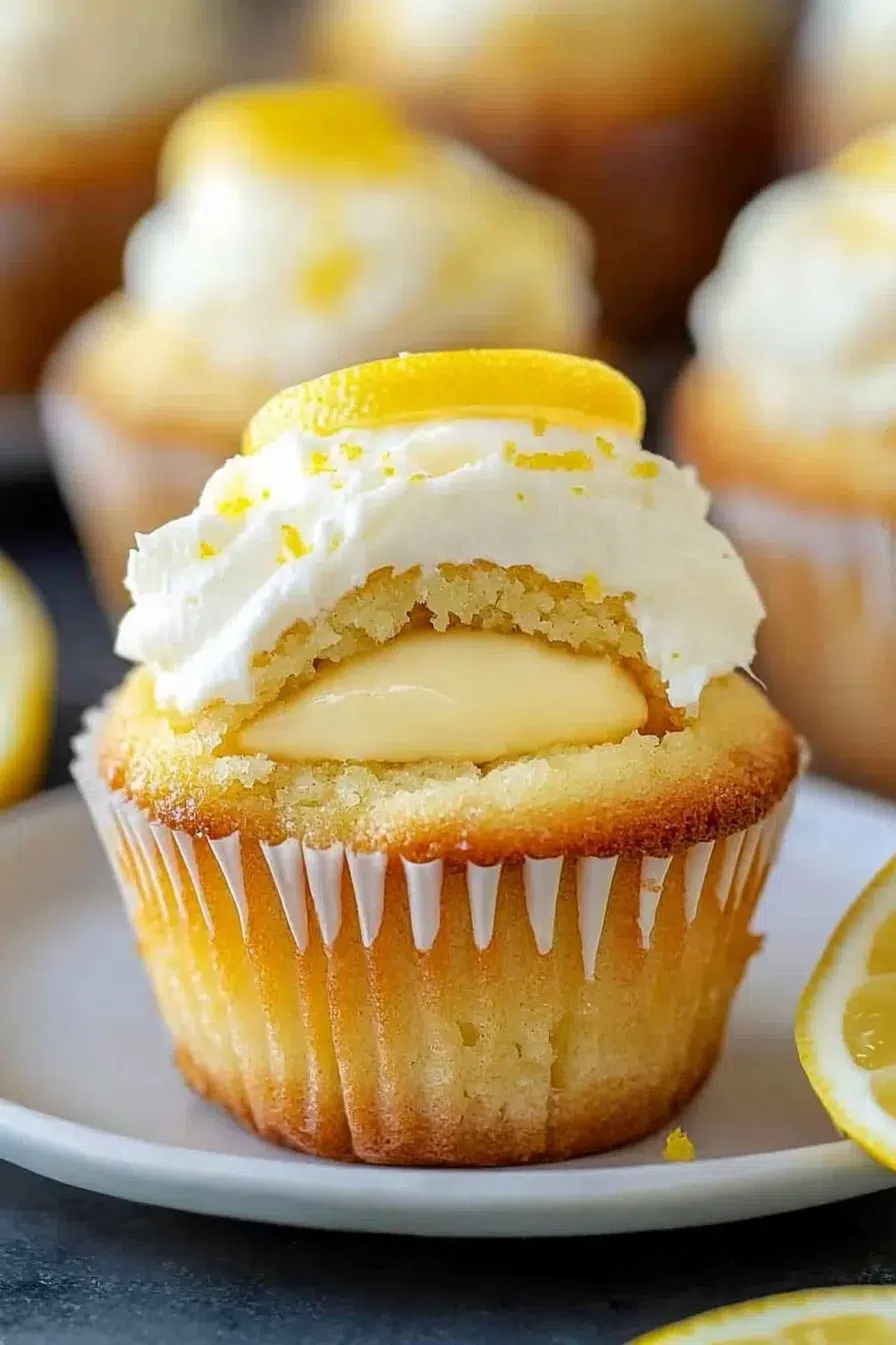 Cheesecake Stuffed Lemon Cupcakes with Lemon Frosting Recipe
