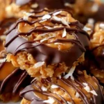 Delicious no-bake Samoa cookies with chocolate, caramel, and coconut topping.